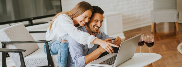 Couple laptop wine