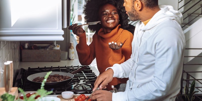 couple cooking together