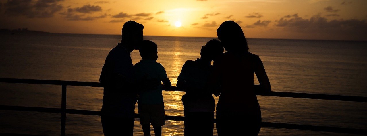 happy family at sunset