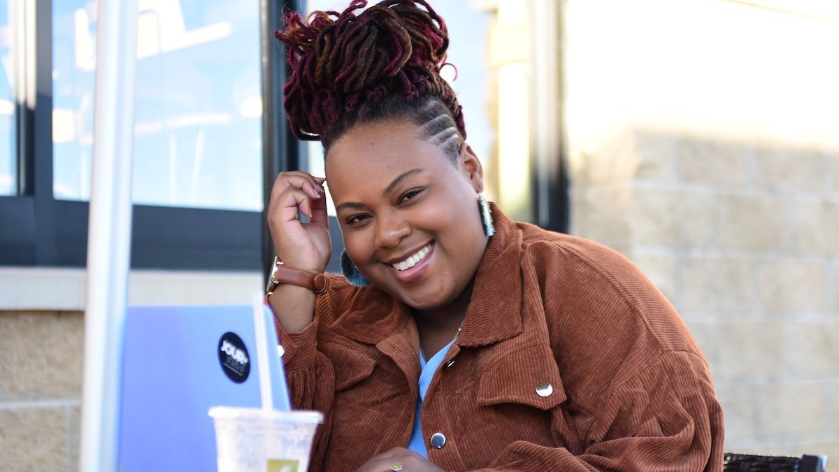 Happy woman at laptop