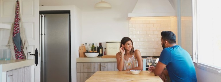 couple talking over wine