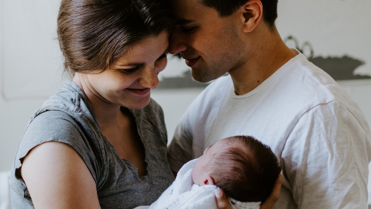 young couple with baby