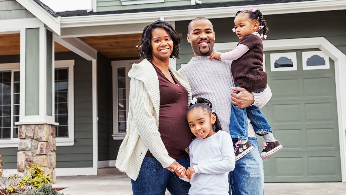 young family by home