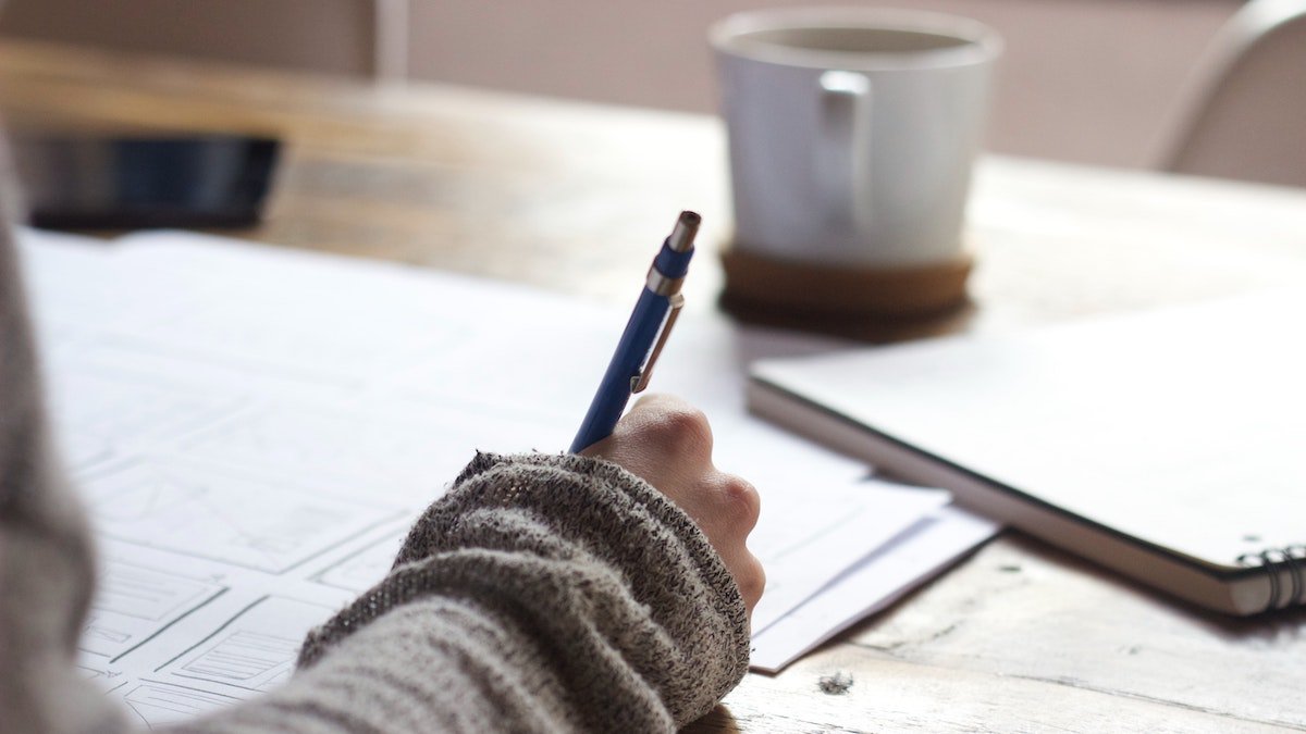 Woman writing check