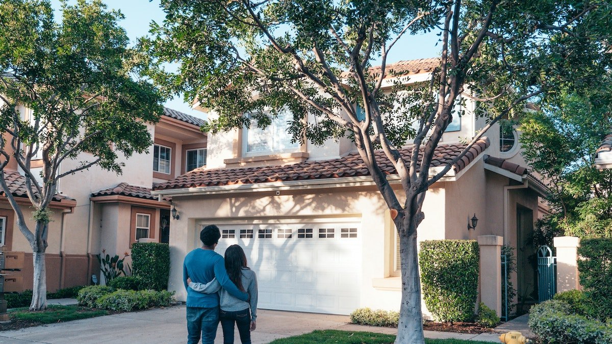 Couple looking at a house